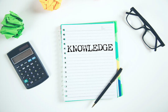 KNOWLEDGE word on white paper