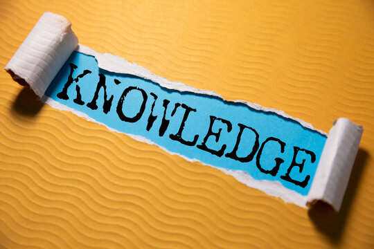 KNOWLEDGE word on white paper