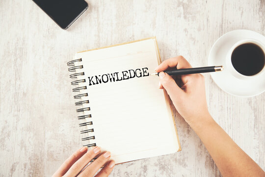 KNOWLEDGE word on white paper