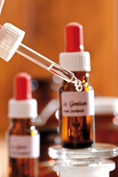 Homeopathic remedies, Drop falling from a pipette, close-up