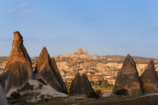 Turkey, Cappadocia, fairy chimneys at Goereme National Park in front of the villages Goereme and Uchisar