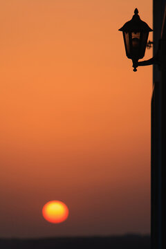 Portugal, Algarve, Sagres, View of lantern with sunset in background