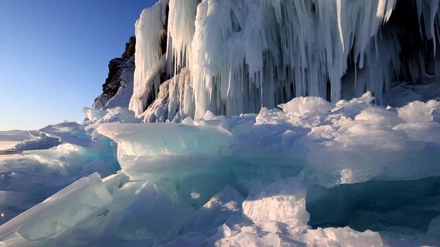 View of the frozen ice formations on Lake Baikal with sunlight reflecting on the crystalline surface in Khuzhir, Irkutsk Oblast, Russia.
