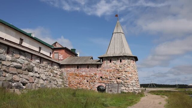 View of the historic stone walls and watchtower of the Solovetsky Monastery in Solovetsky, Arkhangelsk Oblast, Russia.