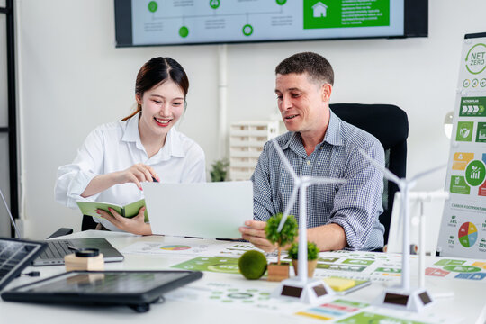 Business Professionals Discussing Sustainable Strategy ESG Inves