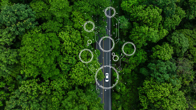 Electric vehicle or EV electrical energy for environment on forest road, Sustainable energy transportation, Electric car and EV electric energy for environment.