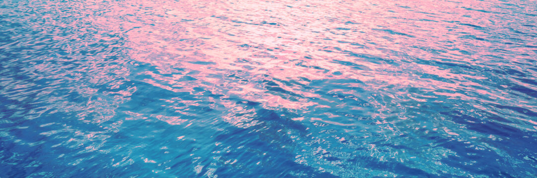 Top view of the seascape. Sea water surface at sunset. Abstract nature landscape background. Gradient color