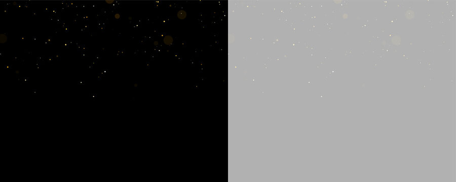 Small luminous particles scatter across a dark background with a range of golden hues. The specks vary in brightness and size, creating a subtle sparkling effect.