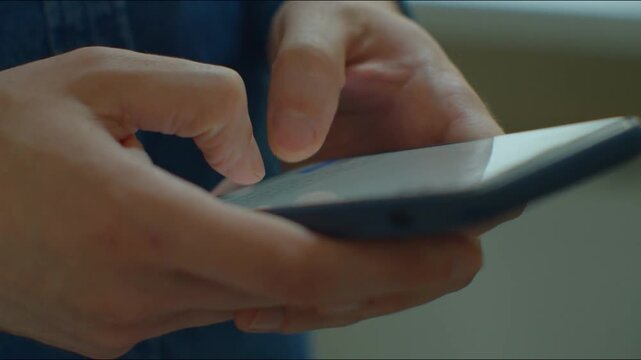 Woman chatting online on smartphone macro close up, typing text message, touching touchscreen keyboard, using messenger application. Female holding mobile phone, swiping social media. man hand browse