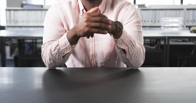 Close up of people talking to the camera, gesturing with hands, man in business attire sitting at of
