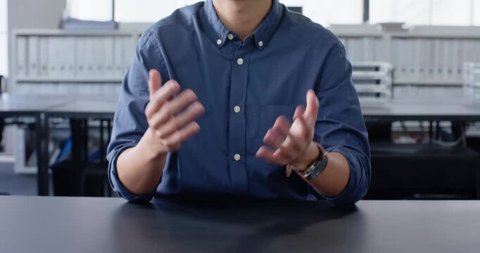 Close up of people talking to the camera, business professional gesturing with hands while discussin