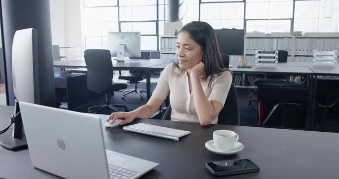 Lifestyle videos indoor of people doing activities at office, working in office, woman using compute