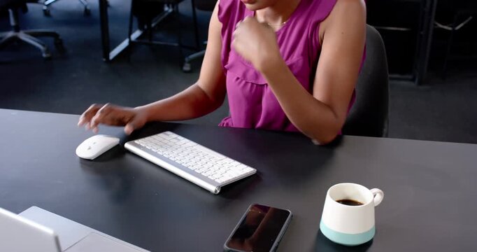 Lifestyle videos indoor of people doing activities at office, typing on keyboard, woman working at d
