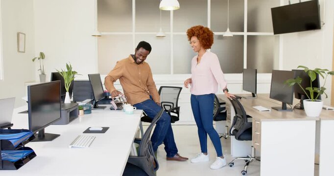 Lifestyle videos indoor of people doing activities at office, colleagues standing and chatting in mo