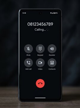Modern Smartphone Displaying Outgoing Call Screen with Number and Interface Icons on Dark Background