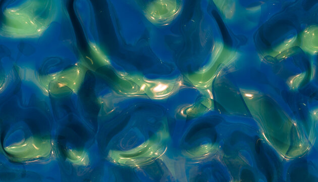 Abstract colorful liquid surface with shiny reflections