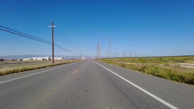 San Joaquin Valley Farmland Buttonwillow 04 Front View Driving Plates of Highway 58 West California USA