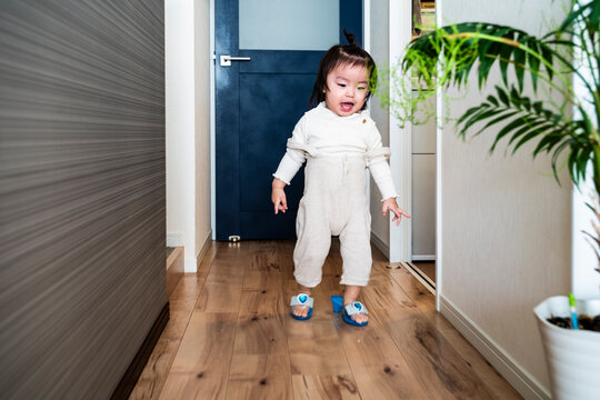 Cute Toddler Girl Walking Indoors Wearing Princess High Heels at Home