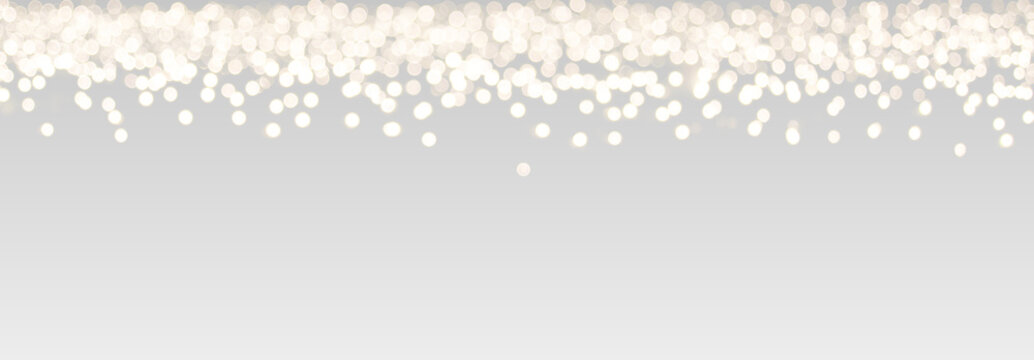 White hexagonal bokeh lights on transparent background. Festive Christmas Light Garlands Glowing festive holiday overlay with alpha channel. Bottom frame element