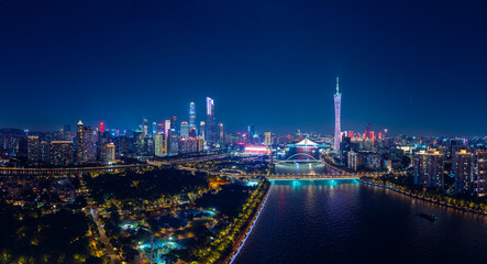 Fototapeta premium Night landscape of illuminated cityscape with skyscrapers, aerial view Guangdong Guangzhou, China