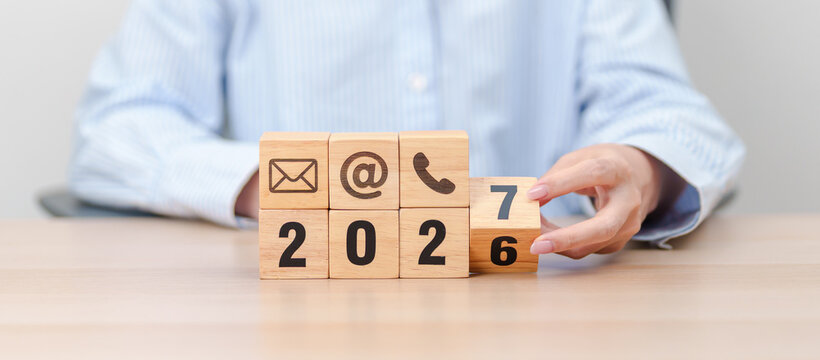Happy New Year 2027 block for Contact Us concepts. Wood block of Email, call Phone and Website Address sign. For Customer support hotline, business Marketing, Corporate, communication and Advertising