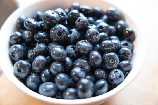 Close-up of fresh blueberries in a bowl. Sweet food, ripe, organic, ready to eat, kitchen, raw and vegetarian food.