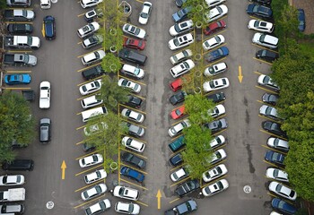 Naklejka premium Scenic landscape with aerial view of parked cars colorful rows in a local parking lot of San Miguel de Allende, Guanajuato Mexico.