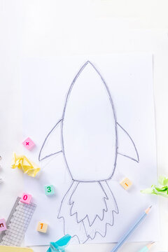Back to school Background with Rocket with School Supplies
