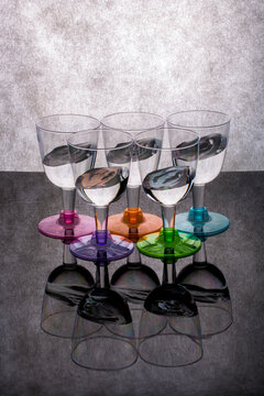 Still life with liquid in glasses on a gray background