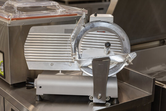 Stainless Steel Electric Meat Slicer Commercial Machine in Professional Kitchen