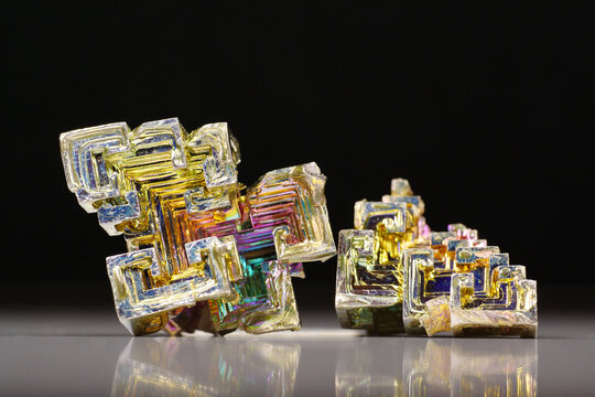 Bismuth crystals. Bismuth - chemical element with symbol Bi and atomic number 83