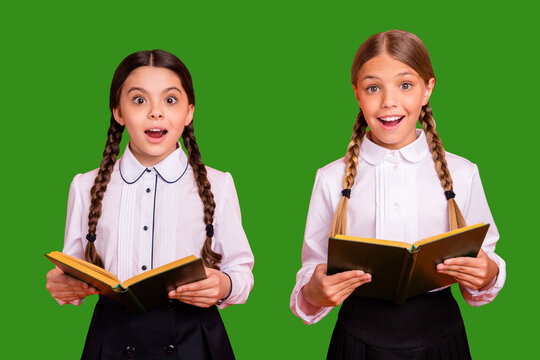 Portrait of two person nice attractive winsome lovely charming cute cheerful cheery pre-teen girls reading diary book science Maths isolated over bright vivid shine orange background