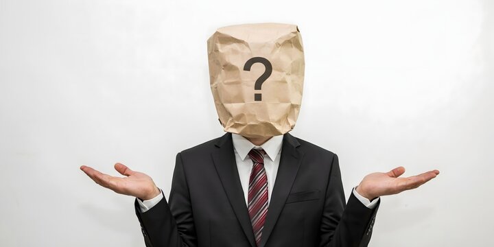 Confused Businessman With Question Mark Paper Bag Representing Uncertainty Decision Making Doubt And Mystery