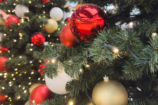 new year cozy home interior with christmas tree and garlands