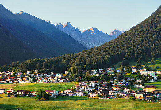 Typical Alps village in Tyrol near Innsbruck in Austria at sunrise.