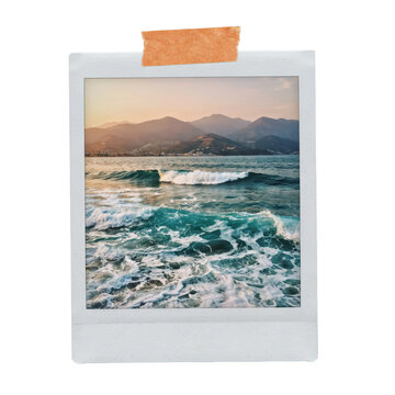 Instant frame featuring a scenic ocean view with rolling waves and distant mountains at sunset isolated on a transparent background