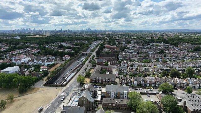 A12 duel carriageway Wanstead East London city skyline in background aerial