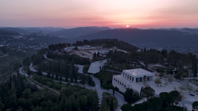 High angle vista of the Yad Vashem memorial complex on Mount Remembrance in Jerusalem during a vibrant sunset
