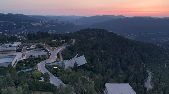 Sunset over the cantilevered exit structure of Yad Vashem Holocaust Museum nestled on Mount Remembrance in Jerusalem