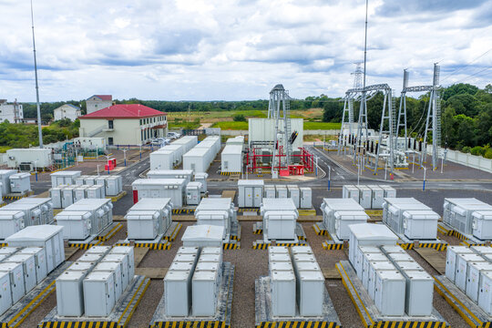 Aerial view of container‑type battery energy storage station and high‑voltage substation