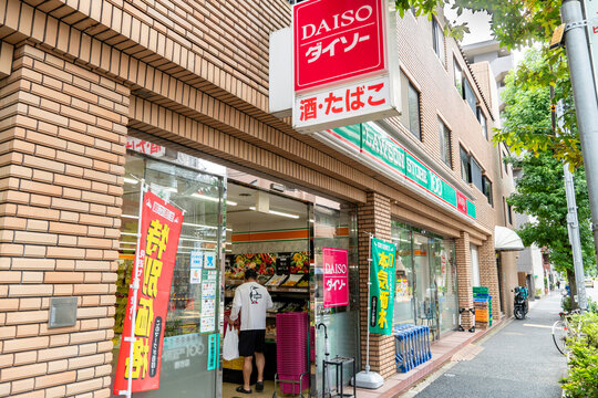 NAKANO-KU, TOKYO, JAPAN - AUGUST 30, 2026: Exterior view of a commercial building housing Daiso 100-yen store in Nakano-ku, Tokyo.