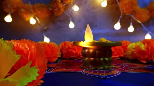 Diwali festival background with diya lamp and marigold flowers