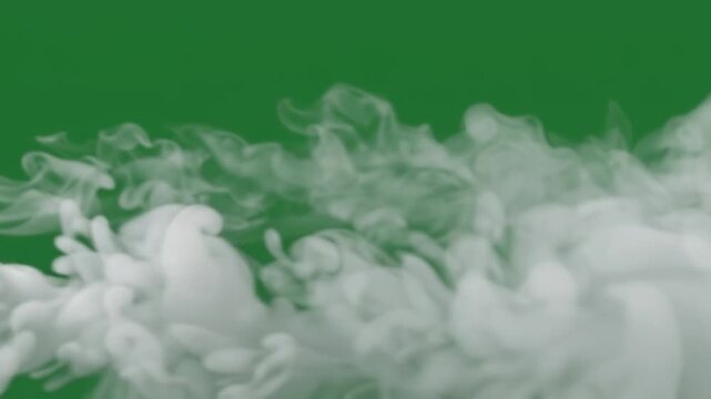 Dense white vapor flows across a vibrant green surface creating dynamic motion patterns and atmospheric texture for visual effects and creative digital design projects throughout the scene