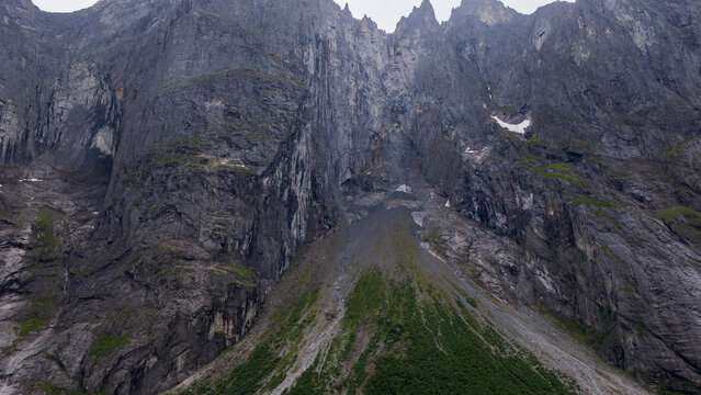 Aerial view of rocky canyon with columnar basalt formations and scree slopes, Eidet Rauma Norway