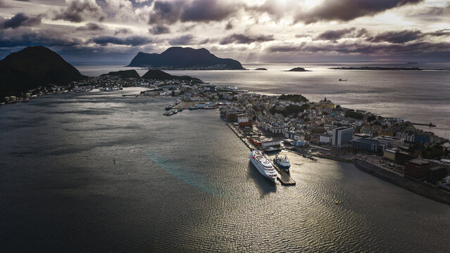 Aerial view of Alesund harbor with cruise ship and surrounding islands, Norway