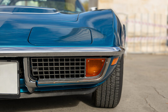 Front Detail of a Classic American Sports Car with Chrome Bumper, Vintage Muscle Car Close-up. Classic Car Detail