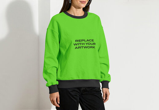 Sweatshirt mockup with trim worn by a person, front view, placeholder text for branding, studio background, clothing design presentation, apparel template, long sleeve, crew neck