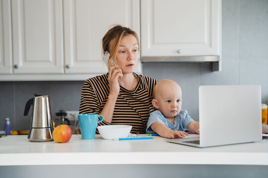 Mother balancing between work and baby on sick or maternity leave.