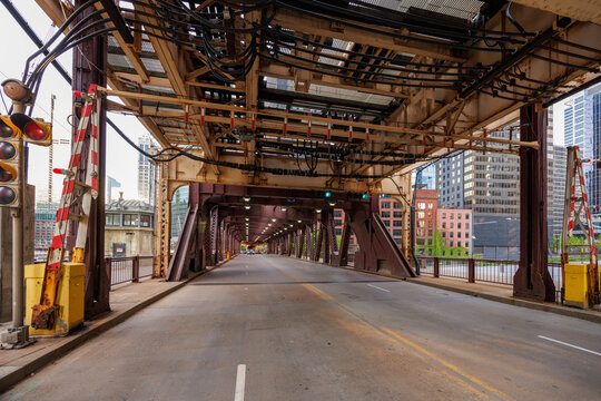 Photo of Chicago taken from a car and railway bridge