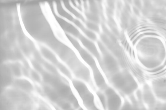 Real concentric ripple caustic shadow cut out on a transparent png background with wavy organic bands. Drops into a serene spa mockup overlay, a minimal spa and wellness composition as a transparent.